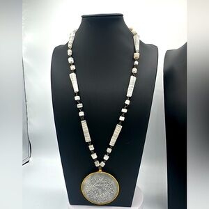 White Onyx medallion necklace.​